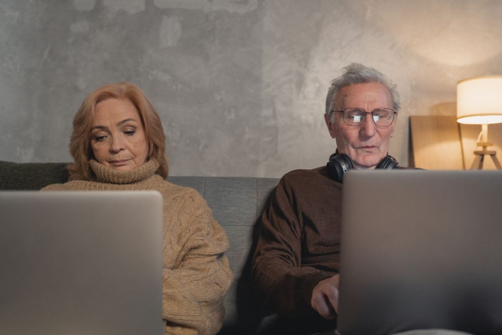 5 Smart Financial Moves to Consider in Your 60s Senior couple reviewing household finances together at home