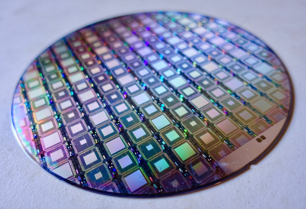 A wafer of quantum computer processors photographed in a research facility.