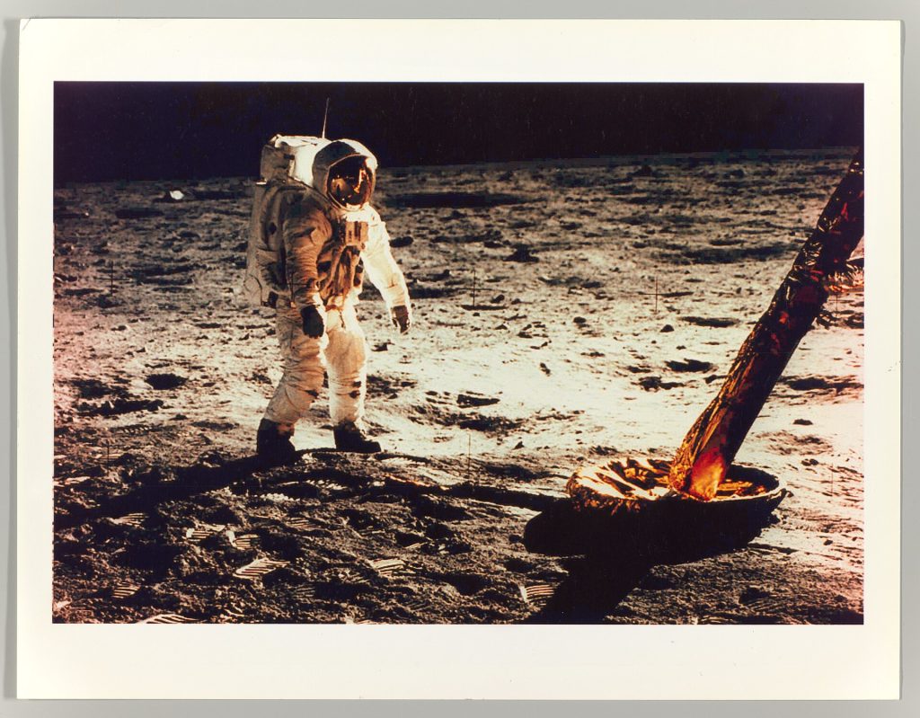 Apollo 11 astronaut Buzz Aldrin walking on the Moon beside the lunar module